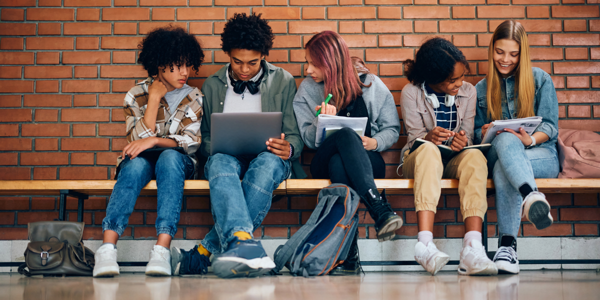 High school students reviewing notes in a quiet environment, showing the importance of focus and organization in developing strong study skills for high school.