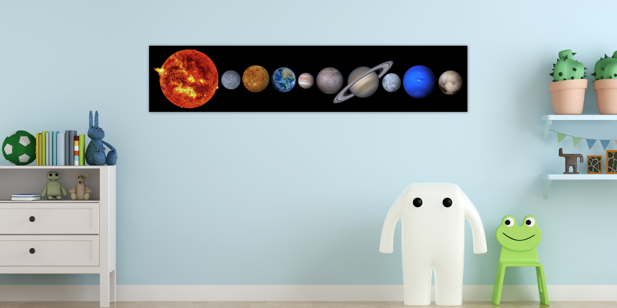 A vibrant poster of the solar system makes a study space more educational, sparking curiosity about astronomy and outer space.